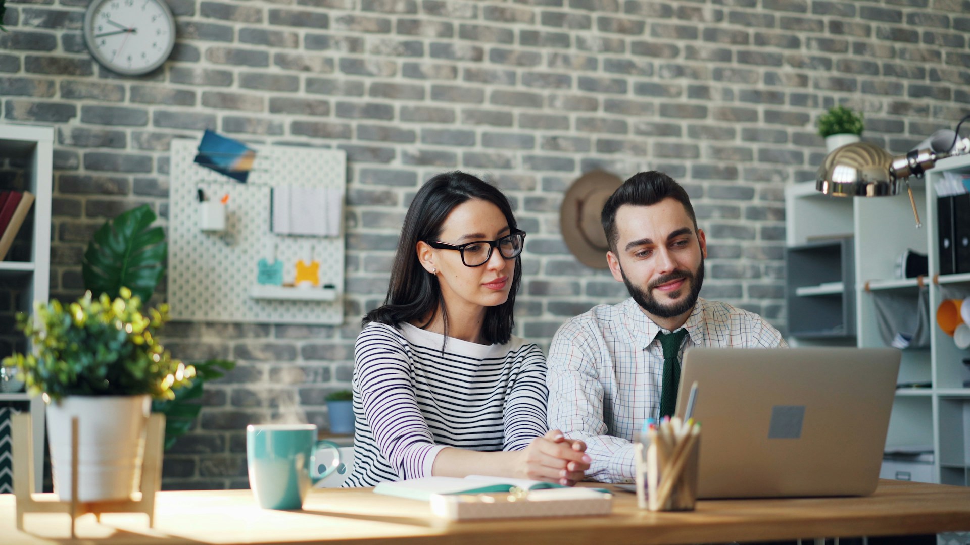 Marketing professionals collaborating on business strategy in a modern office
